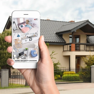 Salinas vivint phone display of cctv live feed in front of a house